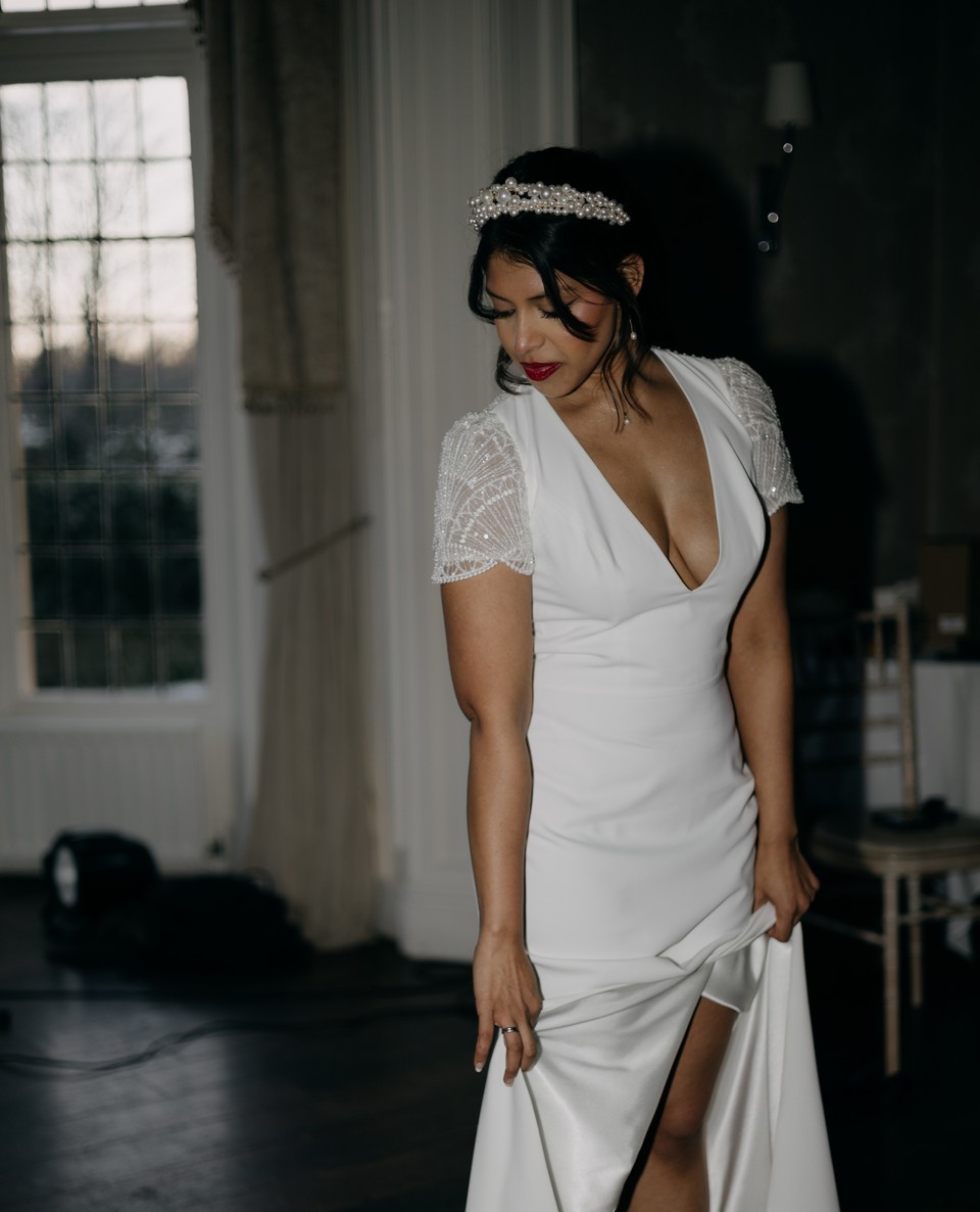 The Ariana dress is a 1920's inspired crepe dress, exuding subtle glamour | Feathers & Florence | Wedding Dress Preston