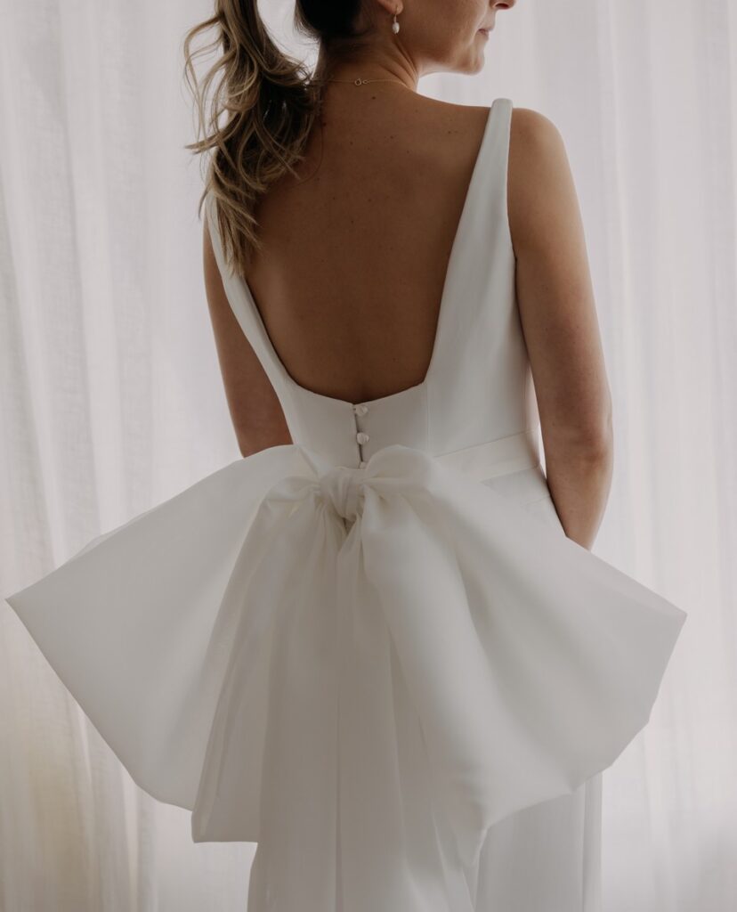 Obsessing day after day, month after month, year after year with this bow! | Feathers & Florence | Wedding Dress Preston