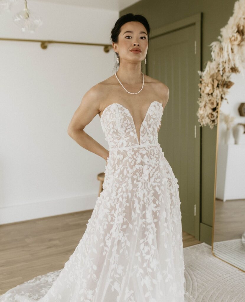 Carla by Savin London.  An A-Line wedding dress, featuring a modern plunge sweetheart neckline | Feathers & Florence | Wedding Dress Preston |