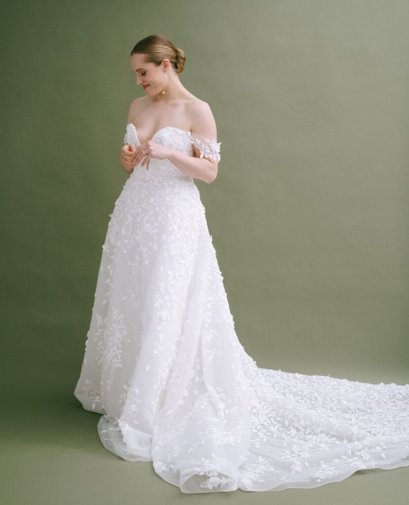 Introducing Carla by House of Savin London. ⁠An A Line wedding dress with petite floral details | Feathers & Florence | Wedding Dress Preston
