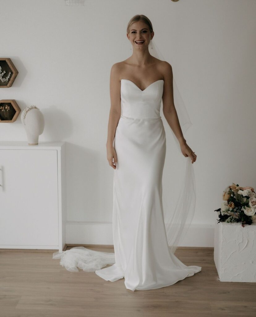 Our Collette dress by Stephanie Allin styled with a Cathedral, double tier veil for a modern classic feel | Feathers & Florence | Wedding Dress Preston